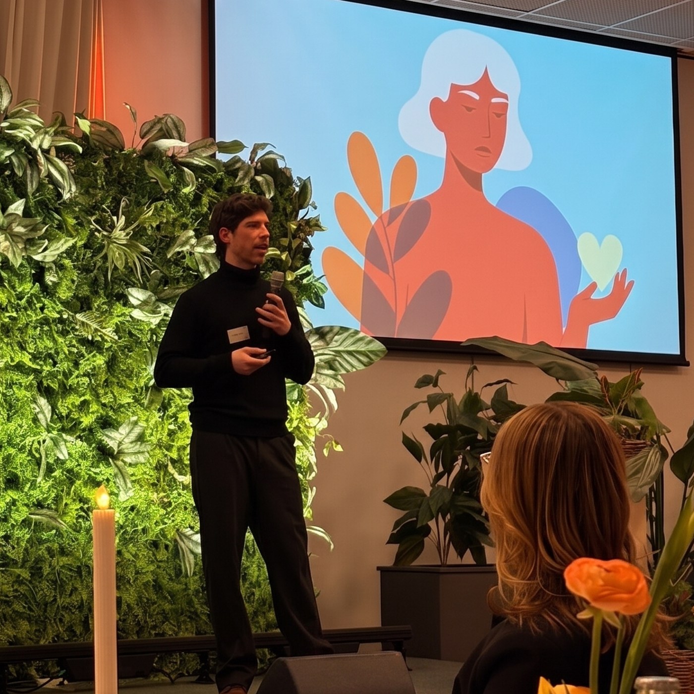 Speaking on stage at a leadership event